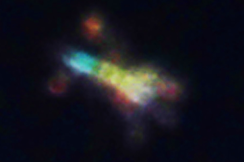Enhanced HD sample showing a very abstract airborne multicolored object